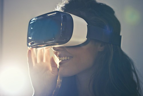 Woman Wearing White Virtual Reality Gogg