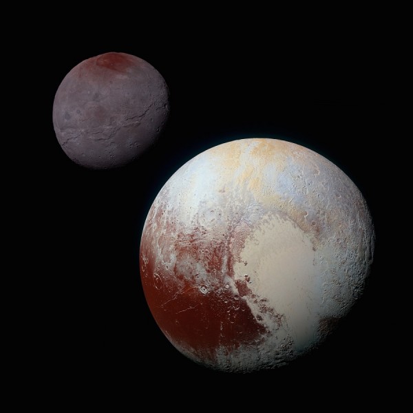 Pluto’s ice-covered “heart” is clearly visible in this false-color image from NASA’s New Horizons spacecraft. (NASA/JHUAPL/SwRI)