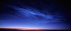 Noctilucent Clouds taken from 36,000 feet above the South of Nunivak Island, Alaska on June 20, 2006. (John Boardman/NASA)