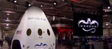 Elon Musk unveiling the Dragon V2 at an event. (YouTube)