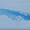 Meltwater stream inside the crater on the Roi Baudouin ice shelf. (YouTube)