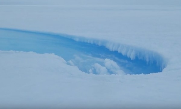 Meltwater stream inside the crater on the Roi Baudouin ice shelf. (YouTube)