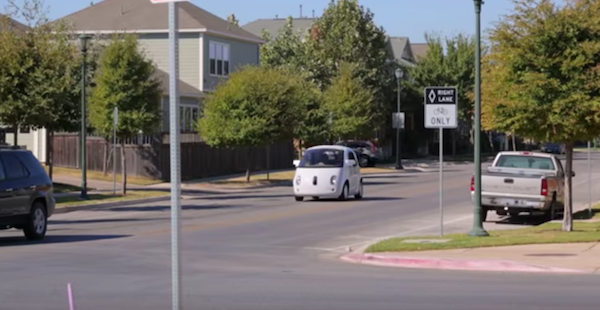 Waymo's driverless car cruising on a street. (YouTube)