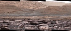 The foreground of this scene from the Mastcam on NASA's Curiosity Mars rover shows purple-hued rocks near the rover's late-2016 location. (NASA/JPL-Caltech/MSSS)