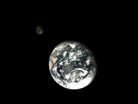 The Chang'e 5 test vehicle service module took this photo of Earth and the Moon together on November 9. (CNSA)