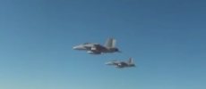 The drones were launched from three F/A-18 Super Hornet fighter jets. (YouTube)