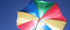 Researchers say a beach umbrella is not enough for sun protection.