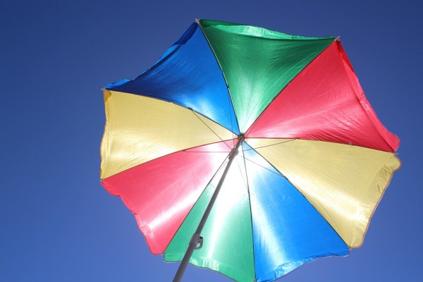Researchers say a beach umbrella is not enough for sun protection.