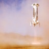 Blue Origin’s New Shepard booster executes a controlled vertical landing at 4.2 mph.
