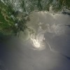Sunlight illuminated the lingering oil slick off the Mississippi Delta from the Deepwater Horizon oil spill on May 24, 2010. 