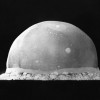 The first nuclear explosion in 1945, depicted as the Trinity Test Fireball.