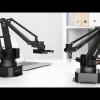 The robotic arm will have the form of an articulated desk lamp, similar to Tony Stark's (Iron Man) advanced desktop helper. (YouTube)