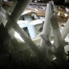 Towering crystals still host 50,000 year old organisms in Naica Cave, Mexico.