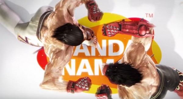 Two 'Tekken' characters fight on top a canvas showcasing Bandia Namco logo.  (YouTube)