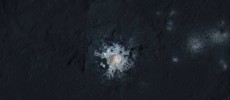 The bright spots in the center of Occator Crater on Ceres are shown in enhanced color in this view from NASA's Dawn spacecraft. (NASA/JPL-Caltech/UCLA/MPS/DLR/IDA/PSI/LPI)