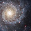 Messier 74, also called NGC 628, is a stunning example of a grand-design spiral galaxy that is viewed by Earth observers nearly face-on. ( NASA, ESA, and the Hubble Heritage (STScI/AURA)-ESA/Hubble)
