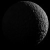 The scene is an orthographic projection centered on terrain at 17.5 degrees south latitude, 325.4 degrees west longitude on Mimas. An orthographic view is most like the view seen by a distant observer looking through a telescope.