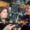 Researchers including MIT professor Daniela Rus (left) and research scientist Stephanie Gil (right) have developed a technique for preventing malicious hackers from commandeering robot teams’ communication networks.           