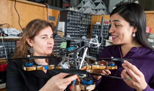 Researchers including MIT professor Daniela Rus (left) and research scientist Stephanie Gil (right) have developed a technique for preventing malicious hackers from commandeering robot teams’ communication networks.           