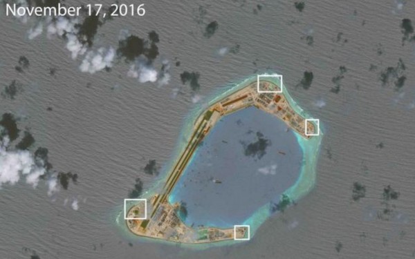 Chinese anti-aircraft guns on Subi Reef.          