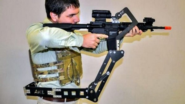 An assault rifle is fired using a prototype body-mount device.                 