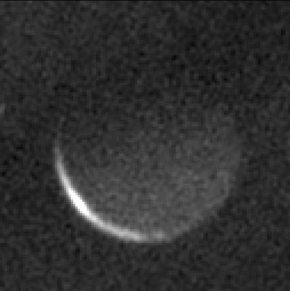 Charon, Pluto's largest moon, was captured by New Horizons on its night side.