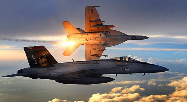 Two U.S. Navy F/A-18E Super Hornets on combat patrol.              