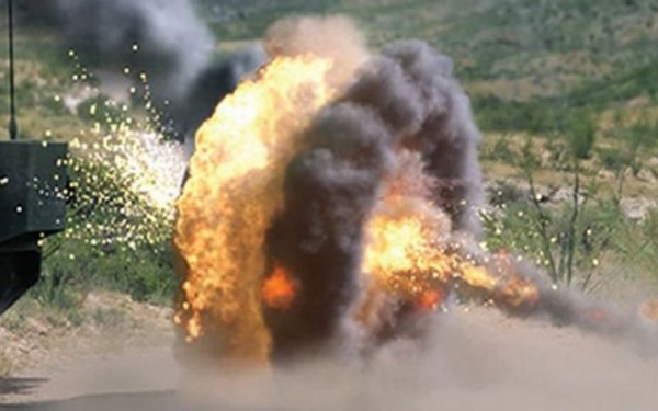 An active protection system destroys an incoming anti-tank rocket.           