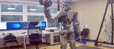 Russia's F.E.D.O.R. robot lifting a dumbbell.