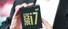 A man holds a Core i7 CPU box. 