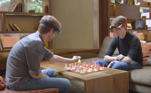 These guys are playing chess using an augmented reality device. (YouTube)