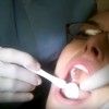 A patient undergoing oral examination. (YouTube)