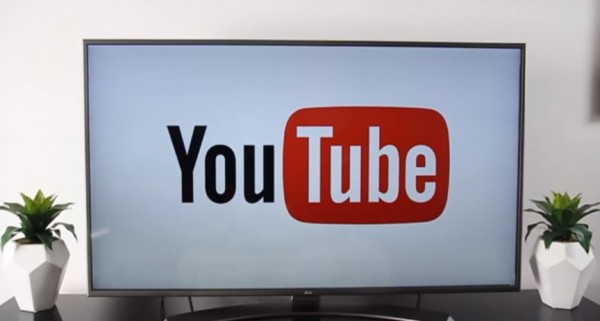 A YouTube logo is shown on a huge screen. 