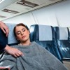 Woman Sleeping on Plane
