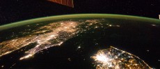 The Korean Peninsula at night. North Korea is almost completely dark, the bright spot is Pyongyang