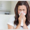Woman Sneezing
