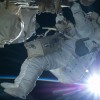 Astronaut Terry Virts conducts a spacewalk during an orbital sunrise on Feb. 21, 2015.