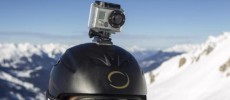 A GoPro camera is seen on a skier's helmet as he rides down the slopes.