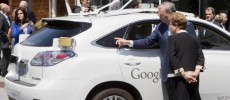 Google Executive Chairman Eric Schmidt (2nd R) shows Brazil President Dilma Rousseff (R) a self-driving car at Google Headquarters in Mountain View.