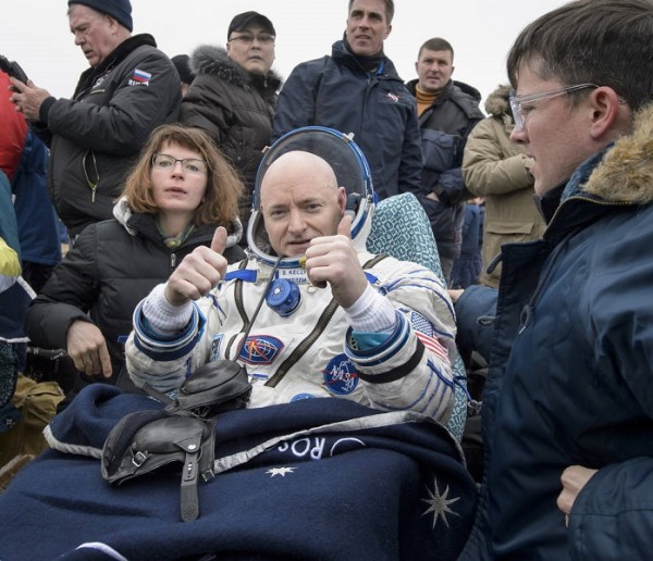 Expedition 46 Commander Scott Kelly of NASA rests in a chair outside of the Soyuz TMA-18M spacecraft just minutes after he and cosmonauts Mikhail Kornienko and Sergey Volkov of the Russian space agency Roscosmos landed in a remote area near the town of Zh