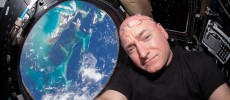 NASA astronaut Scott Kelly inside the cupola of the International Space Station, a special module that provides a 360-degree viewing of the Earth and the station.