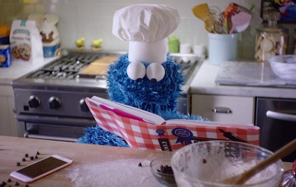 Cookie Monster is impatient when baking cookies with the help of Siri on the Apple iPhone. Luckily, he did not went ahead and eat them raw.