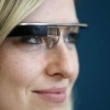 A woman wears Google glasses after a media presentation of a Google apartment in Prague May.