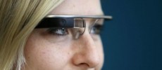 A woman wears Google glasses after a media presentation of a Google apartment in Prague May.