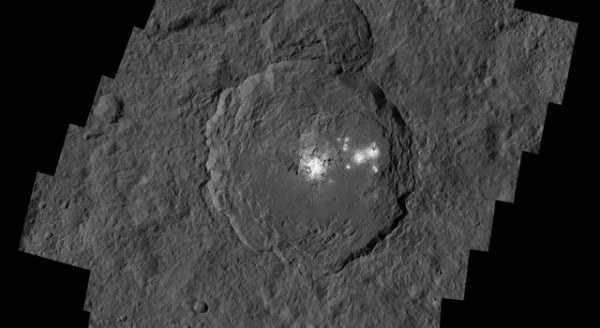 Dawn's close-up view reveals a dome in a smooth-walled pit in the bright center of the crater. 