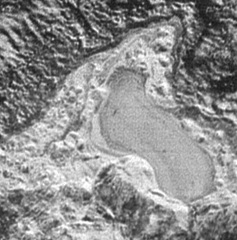 Captured by the New Horizons’ Long Range Reconnaissance Imager (LORRI) as the spacecraft flew past Pluto on July 14, 2015, the image shows details as small as about 430 feet (130 meters). At its widest point the possible lake appears to be about 20 miles 