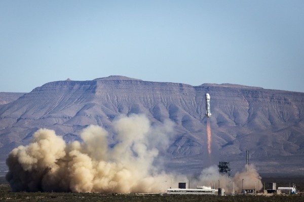 The reusable New Shepard space vehicle ascends through clear skies to an apogee of 339,138 feet.
