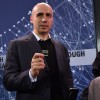Yuri Milner and Stephen Hawking pose with a new chip as they host press conference to announce Breakthrough Starshot, a new space exploration initiative, at One World Observatory on April 12, 2016 in New York City. 