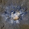 Ceres' Haulani Crater, with a diameter of 21 miles (34 kilometers), shows evidence of landslides from its crater rim. 
