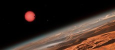 This artist’s impression shows an imagined view from close to one of the three planets orbiting an ultracool dwarf star just 40 light-years from Earth that were discovered using the TRAPPIST telescope at ESO’s La Silla Observatory. 